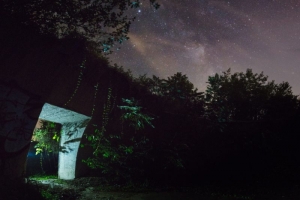 The night's sky opens over a bunker entrance in the "TNT Area," alleged lair of the Mothman, near Point Pleasant, West Virginia.