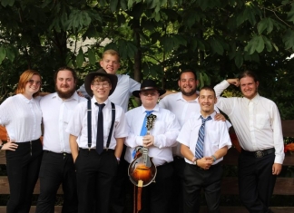 Members of the Glenville State College Bluegrass Band, left to right, include Lydia Boyd, Alex Leport, Logan Phares, Isaac Putnum, Chase Arbogast, Nick Blake, Sammy Murphy, and George Lilly.