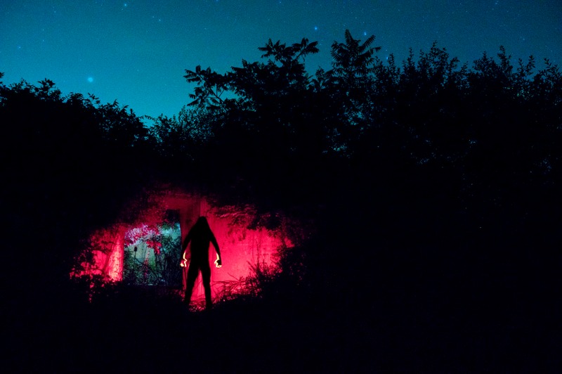 The night's sky opens over a bunker entrance in the "TNT Area," alleged lair of the Mothman, near Point Pleasant, West Virginia.