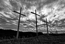 Three crosses rise along a West Virginia ridge.