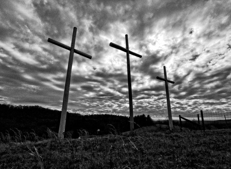 Three crosses rise along a West Virginia ridge.