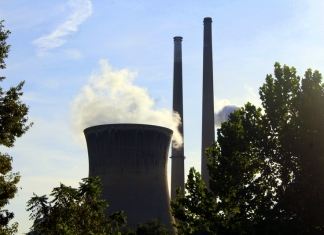 Vapor wafts off a cooling tower at the Willow Island Power Station near Belmont, West Virginia.