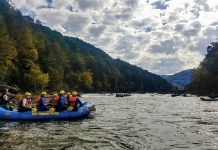A raft launches into the Gauley River during an exciting excursion with River Expeditions.