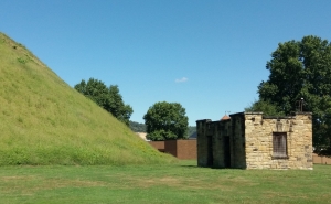 The old museum outbuilding at the Grave Creek stands near the south edge of the mound.