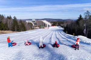 Snow tubers prepare for a run at Snowshoe Mountain.