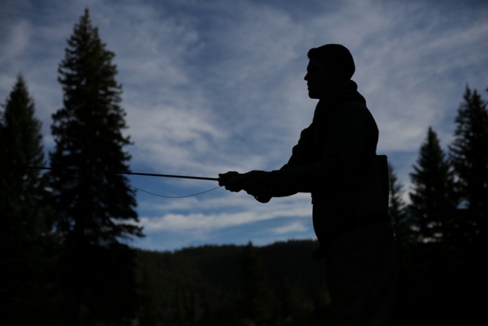 Trout fishing in West Virginia An angler cast for trout in the West Virginia highlands.