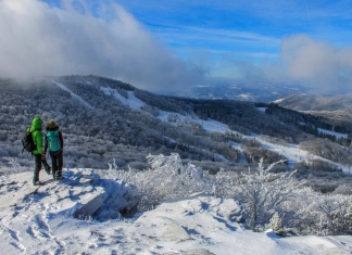 Hikers on Bald Knob survey they ski area at Canaan Valley Resort State Park.