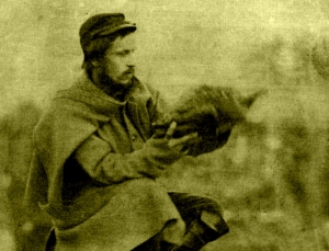 Union soldier Larkin Goldsmith Mead holds a Thanksgiving turkey at Camp Griffin, Virginia, c. 1861.