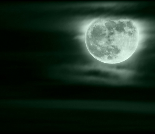 The Wolf Moon customarily rises over the West Virginia hills in January.