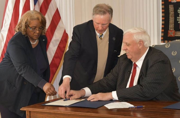 Governor Jim Justice today signed a bill that established Bluefield State College.