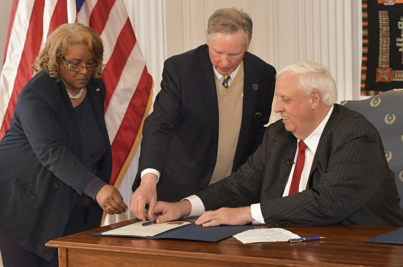 Governor Jim Justice today signed a bill that established Bluefield State College.