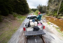 A trout-stocking truck follows a stream into the Allegheny highlands in West Virginia.