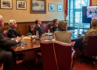 The governor and staff attended a video conference with the President early Monday.