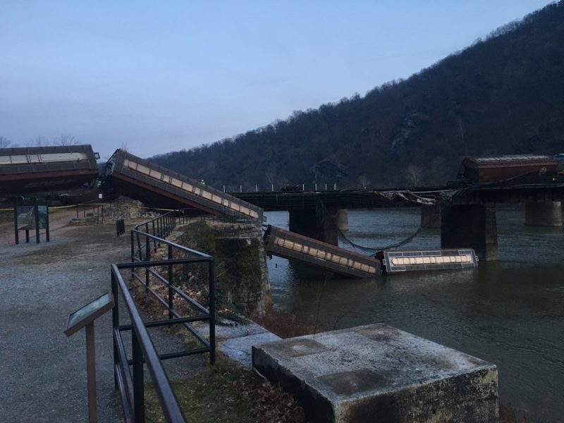 The footbridge over the Potomac at Harpers Ferry was damaged during a derailment (at left). NPS Photo: Autumn Cook