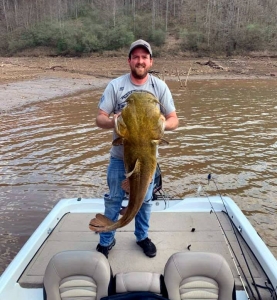 Cody Walker displays a large catfish taken in Burnsville Lake.