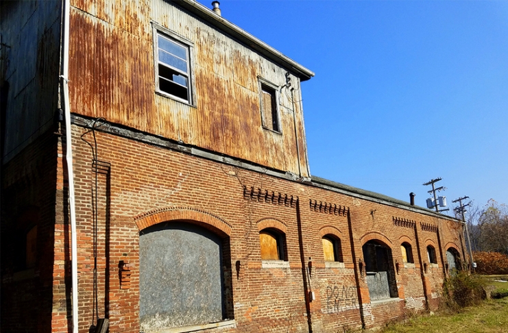This historic freight station in Grafton is among city properties slated for rehabilitation.