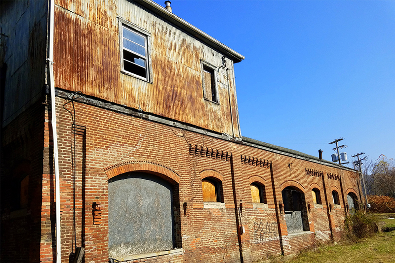 This historic freight station in Grafton is among city properties slated for rehabilitation.