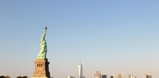 The Statue of Liberty overlooks New York Harbor in New York City.