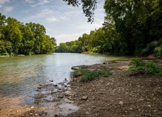 The Elk River flows past Big Chimney eat miles above its mouth at Charleston.
