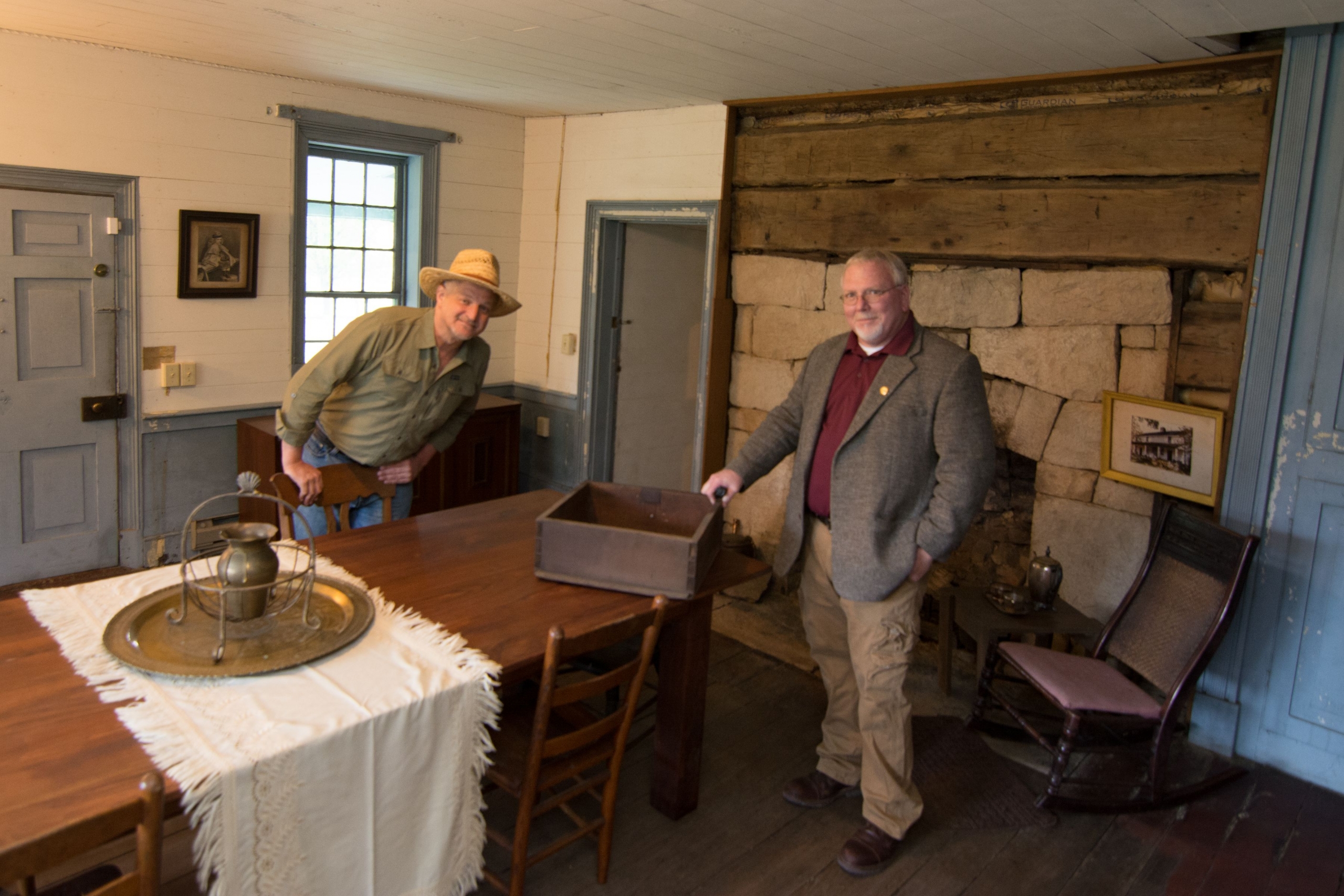 Sibray (left) and Burdette explore stonework and hewn timbers in one of the tavern rooms.