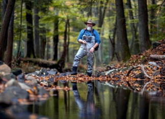 An angler casts into a West Virginia trout stream.
