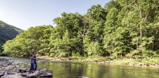 Park guests fish the Bluestone River at Pipestem Resort State Park