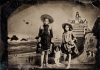 Two young girls pose for a vintage tintype portrait.