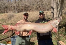 West Virginia fisheries biologist Aaron Yeager (left) with Lucas King (right) holding King's record musky.