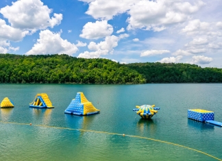Giant inflatable toys await swimmers at the beach at Tygart Lake State Park. (Photo courtesy W.Va. Dept. of Commerce)
