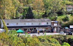 Tourists gather at Rynard's store complex on US-19 at Fayetteville, West Virginia, near New River Gorge National Park.