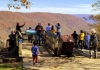 Sightseers gather at the New River Gorge overlook at Grandview.