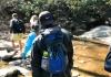 Hikers in creek
