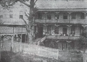 Patrons gather on the porches of Blue Sulphur Springs Hotel near Ona, West Virginia.