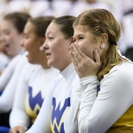 Junior color guard member Abigail Judy reacts to the Mountaineer Marching Band being invited to march in the 2024 Macy’s Thanksgiving Day Parade, on Saturday, Sept. 16, 2023, at the Indoor Practice Facility, in Morgantown, W.Va. (WVU Photo/Matt Sunday)