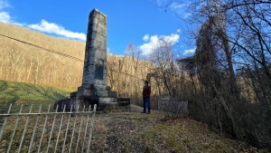 David Sibray studies the Beury Monument