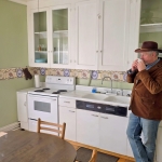 David Sibray in Collins Apartments Kitchen