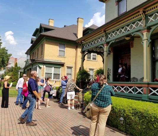 Members of the Preservation Alliance of West Virginia explorer historic homes in Parkersburg, West Virginia.