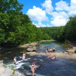 The Middle Fork River at Audra State Park is among the most popular natural swimming holes in West Virginia, attracting visitors throughout the summer. (Photo courtesy Sebastian Chambers)