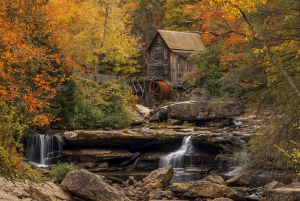 Fall foliage surrounds the Glade Creek Gristmill at Babcock State Park in West Virginia.