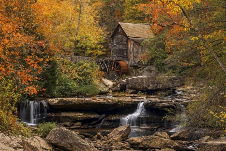 Fall foliage surrounds the Glade Creek Gristmill at Babcock State Park in West Virginia.