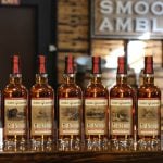 Each bottle of Smooth Ambler in the collection features custom artwork celebrating the landscapes, history, and outdoor experiences that make the parks iconic destinations. (Photo courtesy W.Va. Tourism)