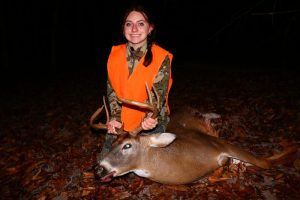 Kelsey Ferguson, of Summersville, W.Va., poses with a trophy buck.
