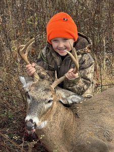 Kylo Benton, of Summersville, W.Va., poses with a big buck. (Photo courtesy W.Va. Dept. of Commerce)