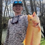 Hunter Rohr, 15, of Buckhannon, West Virginia, has caught a golden rainbow trout that set state records for length and weight.