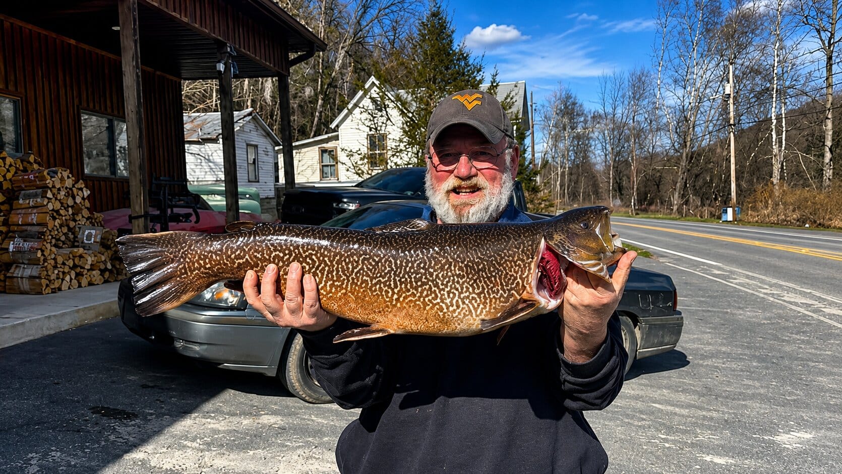 John Terry catches record-breaking tiger trout in lake at Seneca State Forest