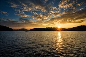 Boaters linger into the evening on Claytor Lake on the New River in Virginia.