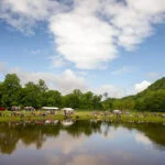 Youth gather for a fishing tournament at the Bowden Fish Hatchery near Elkins, West Virginia. (Photo courtesy W.Va. Dept. of Commerce)