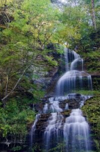 The highest waterfalls in West Virginia, Cathedral Falls tumbles out of the mountains into the New River Gorge. 