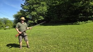 West Virginia Explorer publisher David Sibray carries a replica Civil War rifle at Rich Mountain Battlefield, where a pivotal 1861 Union victory helped secure federal control of western Virginia.