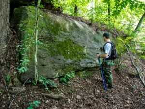 Jesse Mestrovic visits a remote bolder in Tomlinson Run State Park in 2011. (Photo: David Sibray)